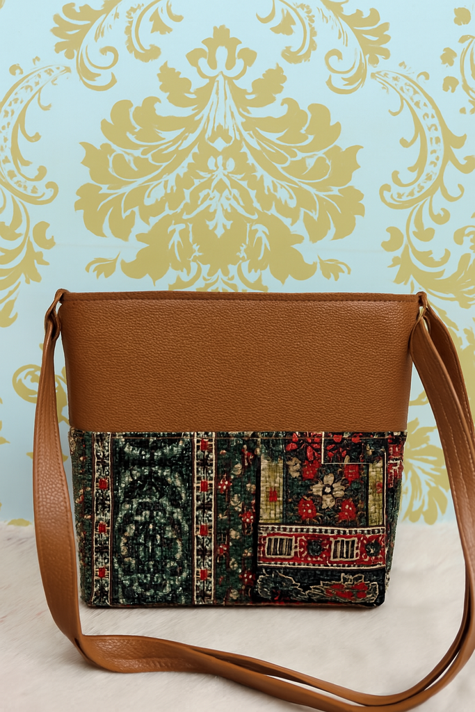 A tassel charm with a gold-toned chain and a brown tassel hang Handmade Handbag for Ladies//தங்க நிற சங்கிலி மற்றும் பழுப்பு நிற குஞ்சம் (tassel) இணைந்த, பெண்களுக்கான கைவினை கைப்பை