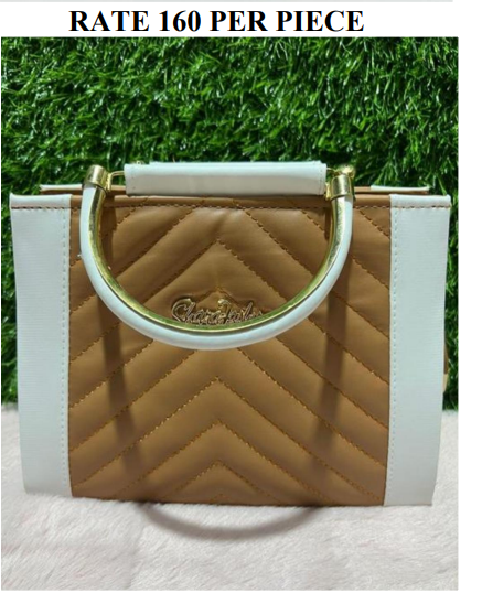 A single, large, gold-toned metal top Handbag for Ladies in Handmade//கைகளால் செய்யப்பட்ட, பெரிய, தங்க நிற உலோக கைப்பிடி கொண்ட, பெண்களுக்கான கைப்பை.