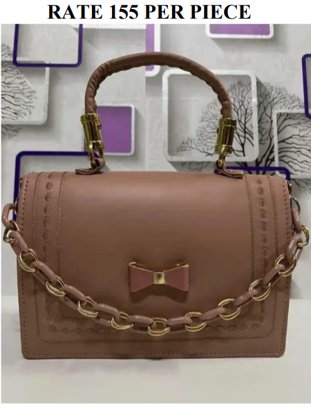 Delicate  pink bow with a gold-toned Handmade Handbag for Ladies//தங்க நிற மையத்துடன் கூடிய மென்மையான  இளஞ்சிவப்பு வில் வடிவமைப்புடன் கூடிய, கைகளால் செய்யப்பட்ட, பெண்களுக்கான கைப்பை.